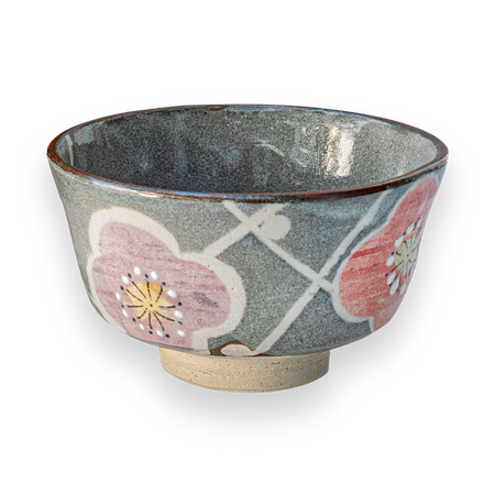 Aprika Life Gray with Flowers Ceramic Matcha Bowl featuring gray glaze and pink/purple floral motifs. Ideal for matcha rituals.
