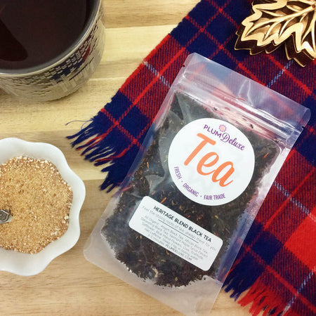 Plum Deluxe Heritage Blend Black Tea (Maple Scottish Breakfast) in a tea bag, featured in a square format image.