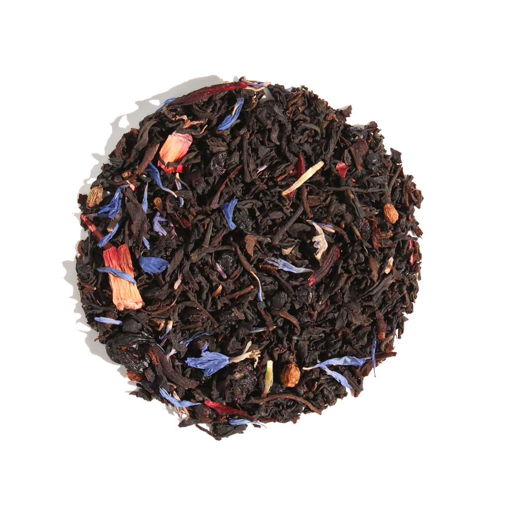 Plum Deluxe Huckleberry Happiness Black Tea, a blend of black tea and berries, shown in a circular package design.