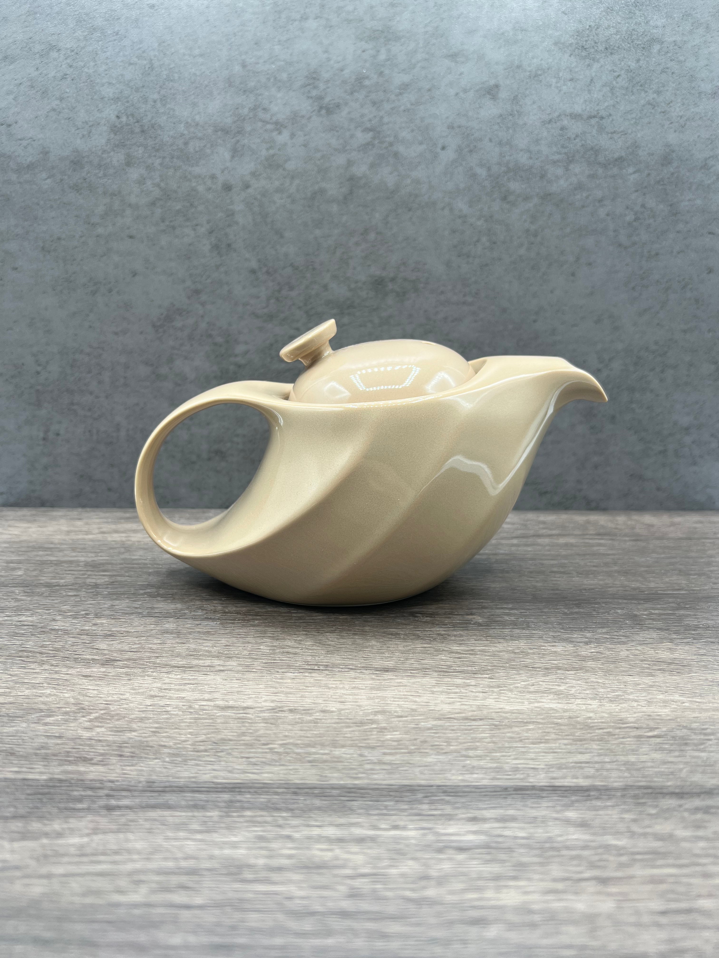 Inoue Tea Rakuchin Beige Mino-yaki Porcelain Kyusu - Japanese Teapot shown in an image on a neutral background.
