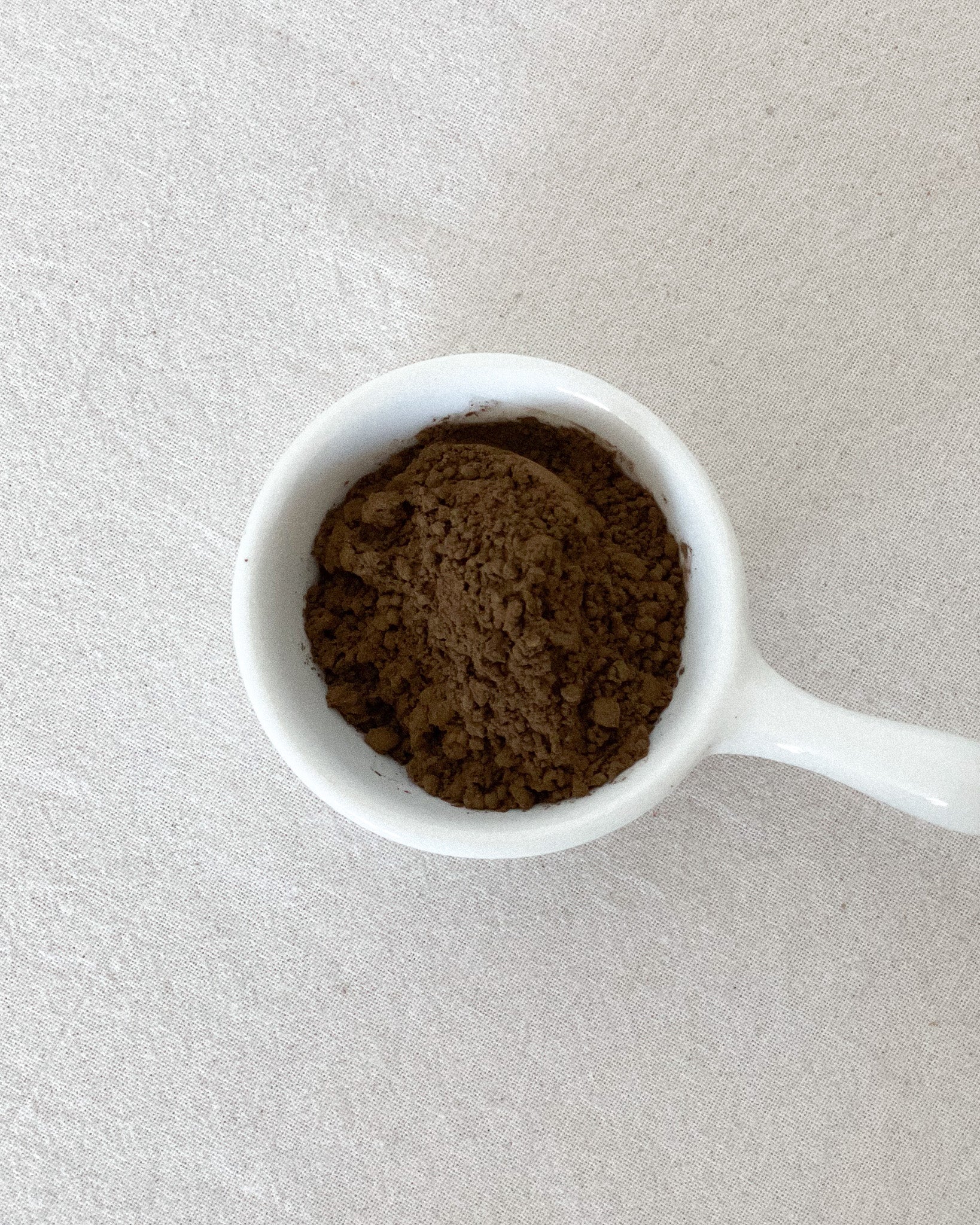 Teappo Coffee Oolong Powder in a clear package, showcasing the fine powder texture and the brand name prominently displayed.