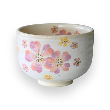 Aprika Life Japanese Pink Sakura Ceramic Matcha Bowl, handcrafted from white clay with a sakura pattern, 5.1 inches wide and 3.5 inches tall.
