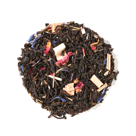 Plum Deluxe Kitchen Table Blend Black-Green Tea (with Secret Citrus Mix) in a circular packaging with citrus and floral imagery.