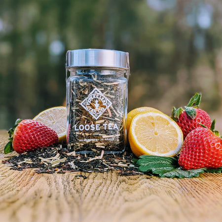 Piper and Leaf Lemon Berry Blush Glass Jar of Loose Leaf Tea - 30 Servings, featuring ingredients like Ceylon Black Tea and strawberries.