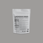 Lemongrass & Ginger Loose Leaf by Somage USA displayed in a clear package with visible loose tea leaves and herbs.