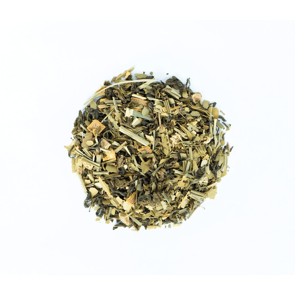 Mystique Mélange by Nepal Tea, a loose leaf tea blend displayed in a natural setting with a focus on the tea's textures.