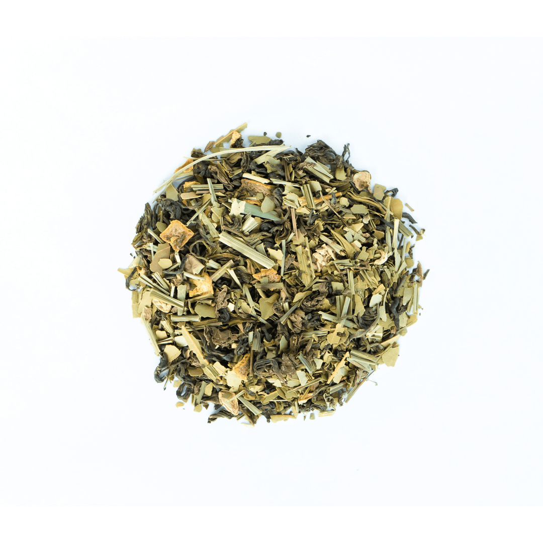 Mystique Mélange by Nepal Tea, a loose leaf tea blend displayed in a natural setting with a focus on the tea's textures.