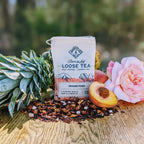 Piper and Leaf Orchard Peach Muslin Bag of Loose Leaf Tea - 15 Servings, showing tea ingredients in a muslin bag.