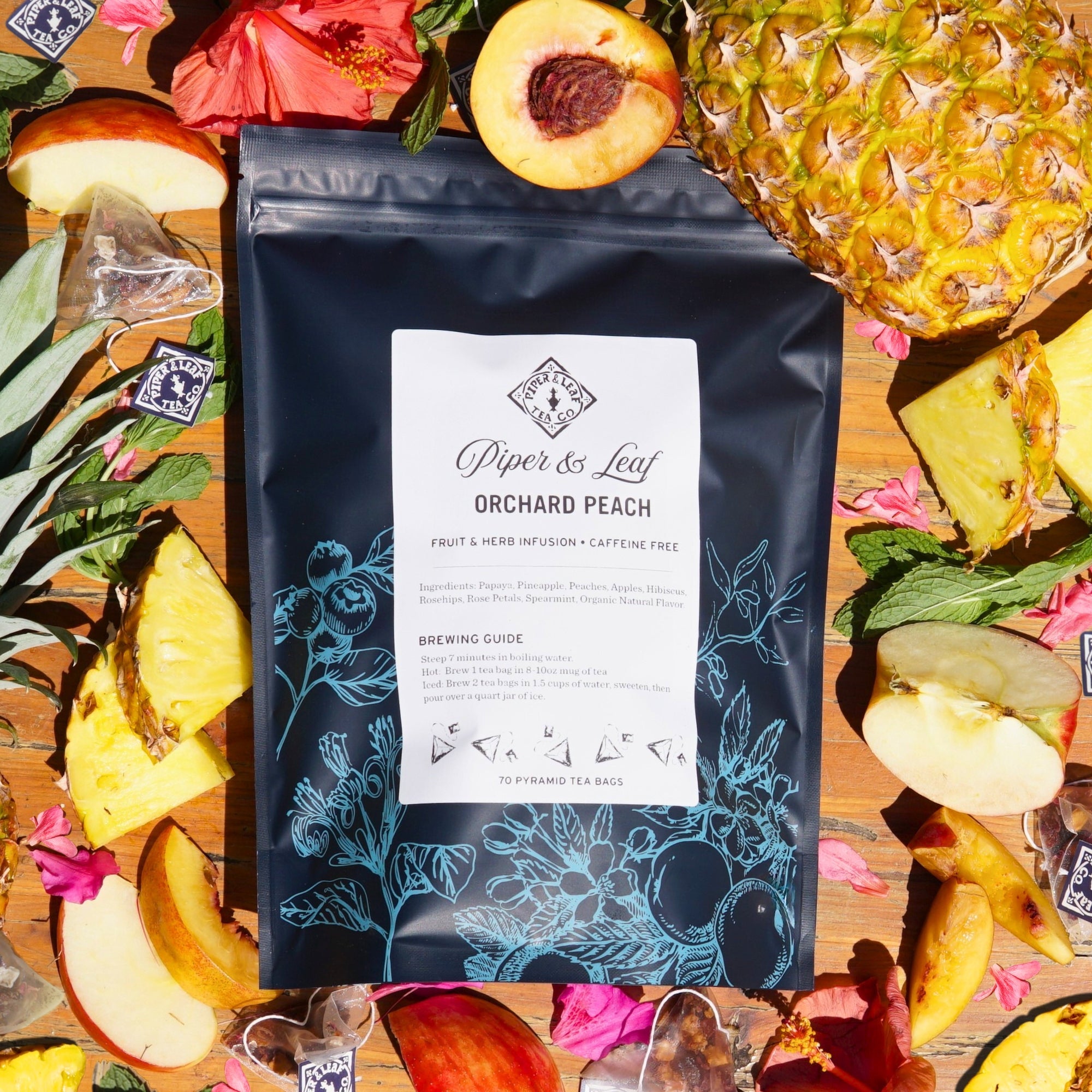 Piper and Leaf Orchard Peach Bulk Sachets - 70ct Tea Bags, featuring a vibrant peach tea blend in a sealed packaging.