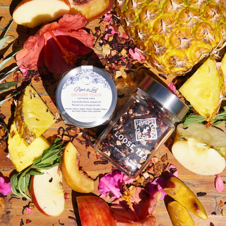 Piper and Leaf Orchard Peach Glass Jar of Loose Leaf Tea - 30 Servings, featuring a glass jar filled with peach tea blend.