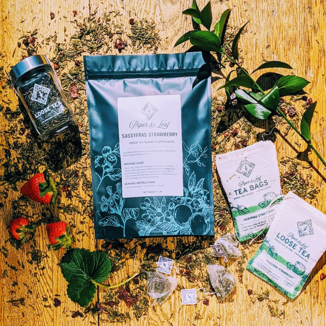 Piper and Leaf Sassyfras Strawberry Bulk Sachets - 70ct Tea Bags, featuring green tea, strawberries, and sarsaparilla in a sealed bag.