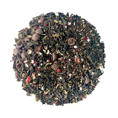 Beach House Peppermint Mocha artisan loose leaf tea shown in a bag, featuring organic peppermint, cacao nibs, and dark chocolate.