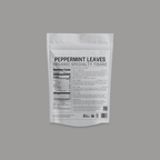 Peppermint Pyramid Bags by Somage USA, featuring pyramid-shaped tea bags with peppermint leaves in a clear packaging.