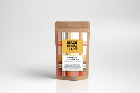 Beach House Pumpkin Harvest Chai in a pouch, displaying warm autumn colors and pumpkin-themed design.