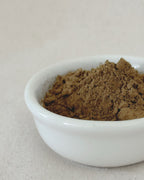 Teappo Red Oolong Powder in a bag, showcasing the product's packaging design and branding