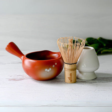 Aprika Life Red Flowers Ceramic Matcha Bowl with Spout, Bamboo Matcha Whisk and Whisk Holder Set displayed together.
