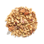 Plum Deluxe Rejuvenation Blend Herbal Tea (Ginger - Lemon) in a circle packaging, featuring ginger root and lemon peel.