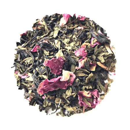 Beach House Rose City Dark organic loose leaf tea blend with black tea, peppermint, and rose petals in a tea cup.