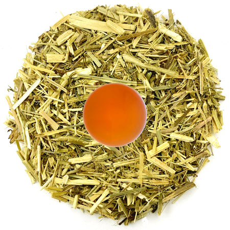 Danfe Tulsi Chamomile Tranquility Herbal Tea, loose leaf, displayed with brewed tea showcasing Himalayan herbal ingredients.