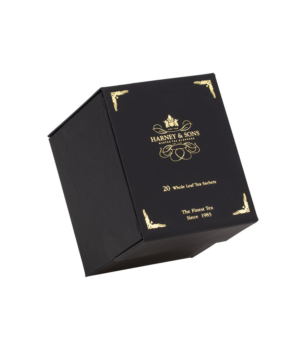 Harney & Sons Harney Heritage – Wrapped Sachet Sampler Black Box featuring assorted wrapped tea sachets in a black box.