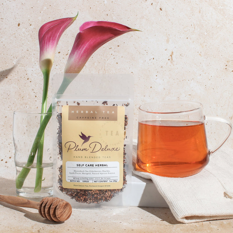 Plum Deluxe The Self Care Blend (Elderberry - Apricot) in a lifestyle setting, showcasing the product packaging and ingredients.