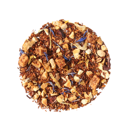 Plum Deluxe Soul Warmer Herbal Tea (Hazelnut - Chestnut - Caramel) in a circular packaging, featuring nutty caramel flavor notes.
