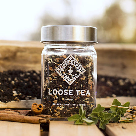 Piper and Leaf Sunrise Chai Glass Jar of Loose Leaf Tea - 30 Servings in a clear glass jar with a label, showcasing tea contents.