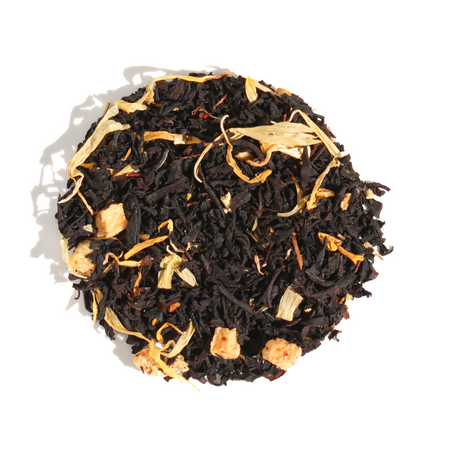 Plum Deluxe Sweet Georgia Peach Black Tea (Hint of Caramel - Walnut) in a circular packaging with peach and caramel flavor notes.