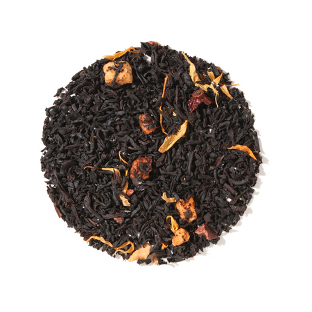 Plum Deluxe Sweet Spot Black Tea (Butterscotch) in a circular package, featuring ingredients like black tea and cacao nibs.