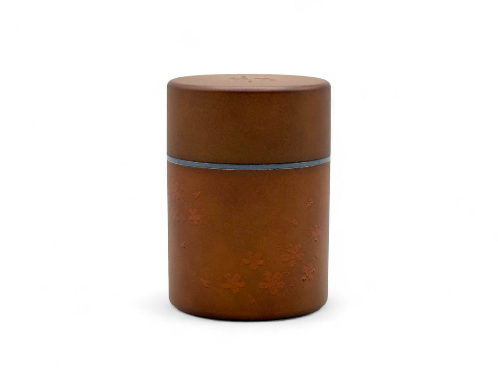 Inoue Tea Sakura Brown Polished Grain Resin Tea Canister by Miyamoto Sangyo, a Japanese chazutsu for storing tea.