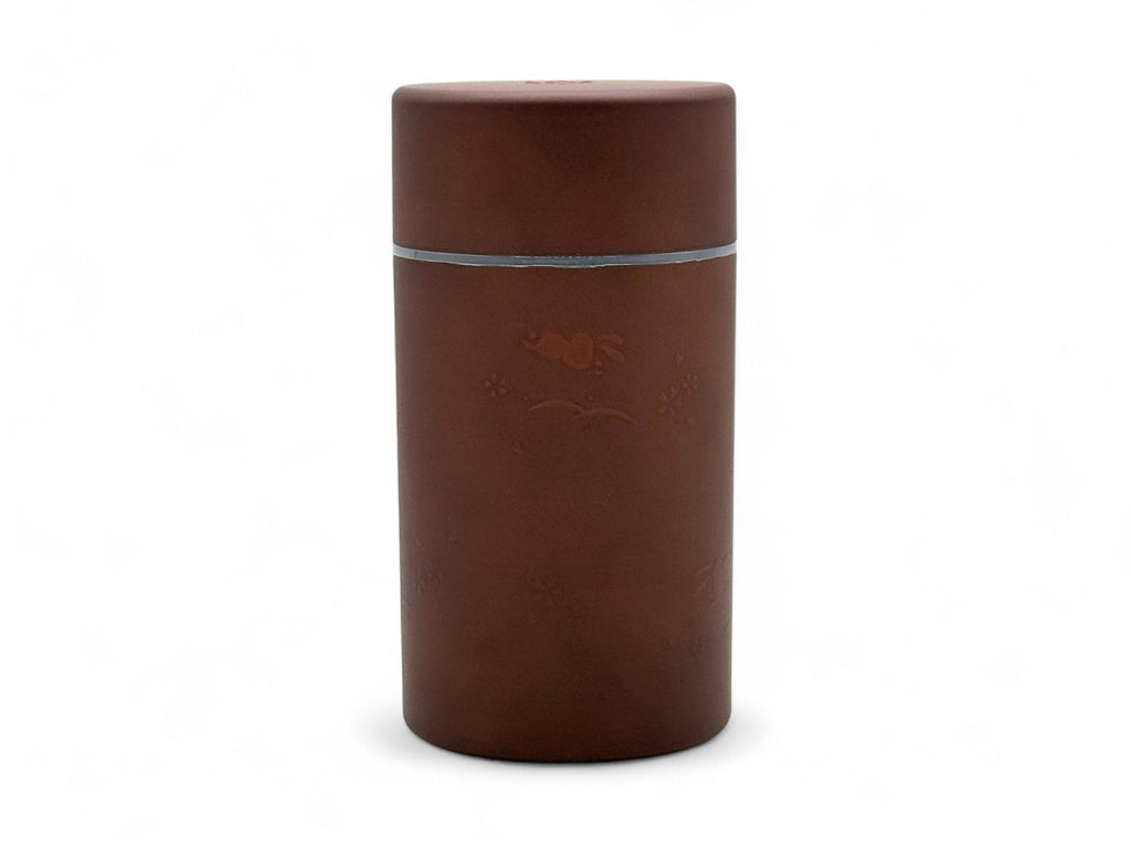 Inoue Tea Usagi Rabbit Brown Polished Grain Resin Tea Canister by Miyamoto Sangyo, a Japanese chazutsu for storing tea.