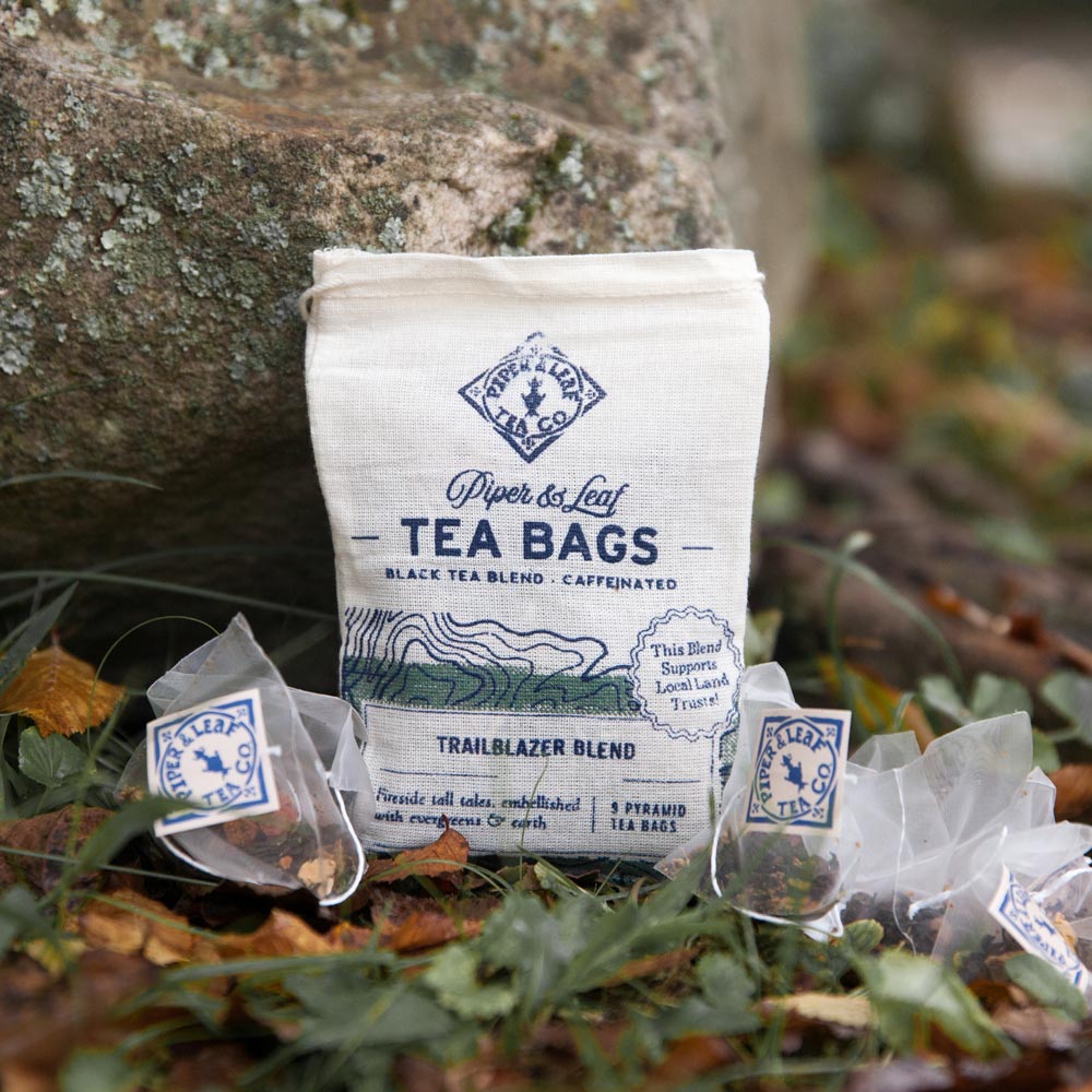 Piper and Leaf Trailblazer Blend 9ct Tea Bags in Muslin, featuring hand-printed muslin bags with pyramid sachets of earthy tea.