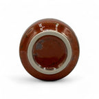 Inoue Tea Shun Nagashi Red Mino-yaki Yunomi - Japanese Teacup, shown in a detailed image of a traditional red ceramic teacup.