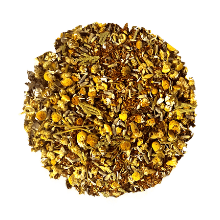 Beach House Timberland Meadows Tea in a cup, showcasing the reddish-brown brew and natural ingredients for a calming experience.