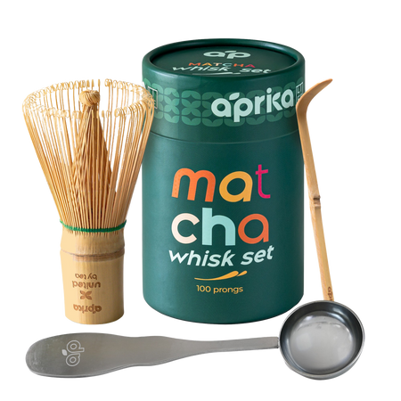 Aprika Life Matcha Bamboo Whisk Set featuring a bamboo whisk, bamboo scoop, and stainless steel spoon in a gift box.