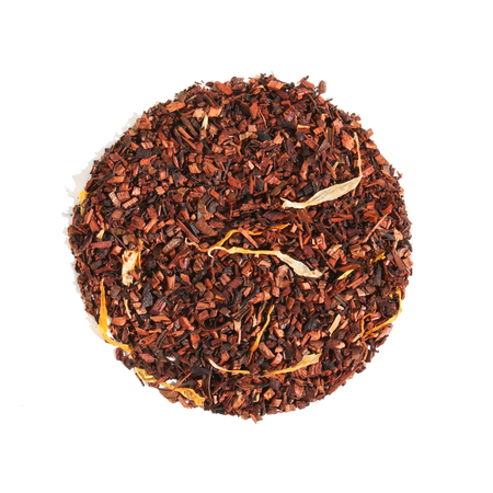 Plum Deluxe Vanilla Creme Herbal Tea in a circular package, showcasing honeybush tea with vanilla cream flavor.