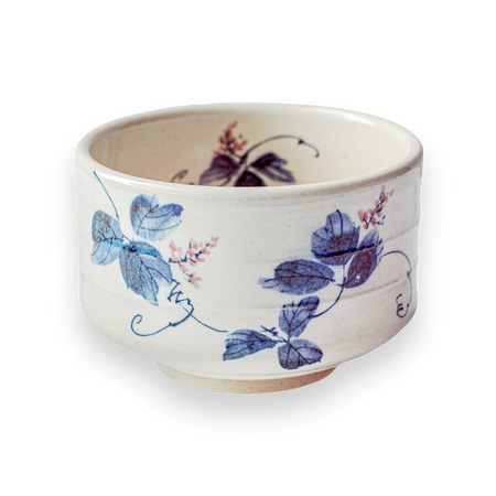 Aprika Life White Clay Kudzu Flowers Matcha Bowl, white clay with pink floral accents and blue leaves, ideal for tea ceremonies.