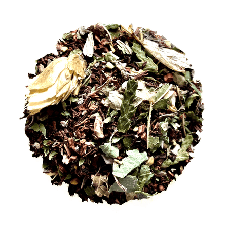 Beach House Woodland Trek organic loose leaf tea, featuring honeybush, licorice, sage, and Washington hops, shown in a tea cup.