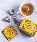 Harney & Sons Yellow & Blue, HT Tin of 20 Sachets displayed in an elegant tin packaging with a colorful design.