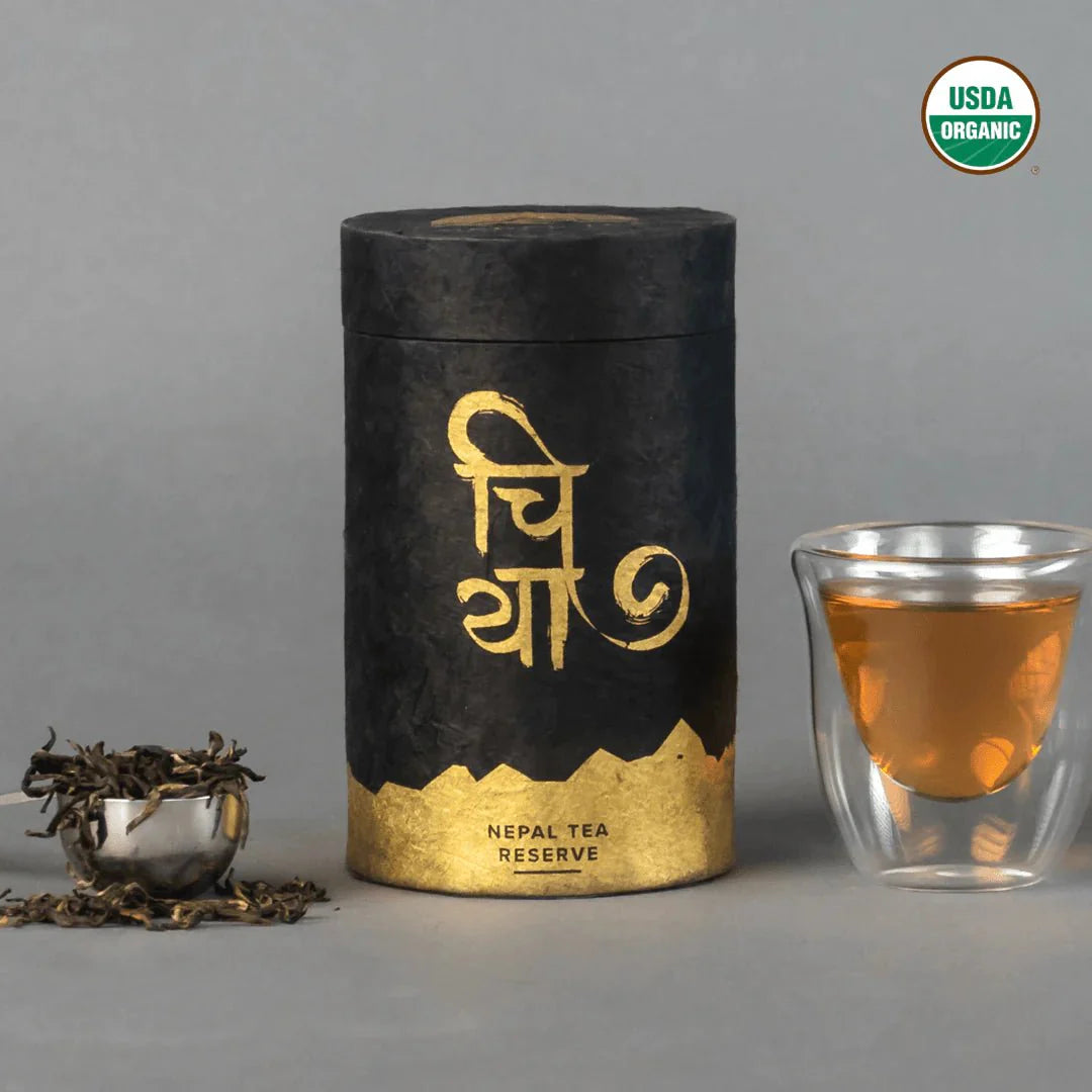 Baraha Fruity Black tea by Nepal Tea in a loose leaf form, displayed in a clear packaging with vibrant colors.