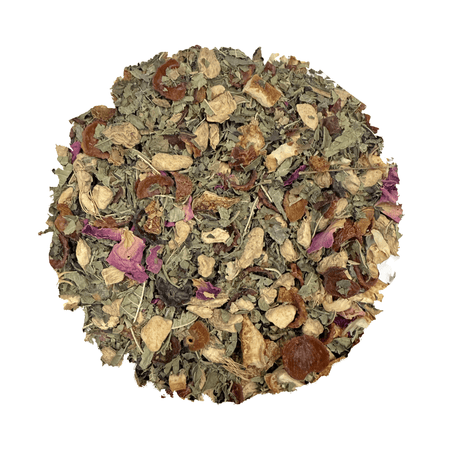Beach House Beach Wellness: Beautiful Tea in a clear cup, showcasing vibrant colors and organic ingredients for wellness.