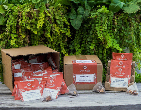 Piper and Leaf Orchard Peach Case of Individually Wrapped Tea Bags- 50ct, showing a box of 50 individually packaged tea sachets.