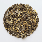 Tea with Tae Calming Tea Pouch by Tea with Tae, featuring a sealed pouch with calming herbal tea blend.
