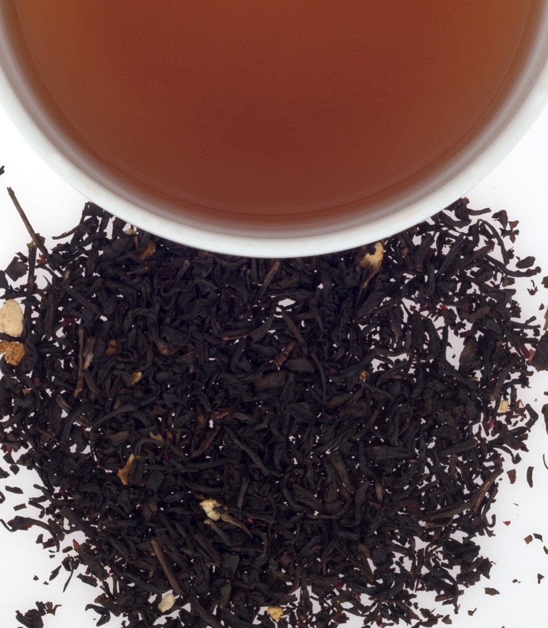 Harney & Sons Cranberry Autumn, Tin of 20 Sachets with a cup of brewed tea, showcasing the tea's rich color and aroma.