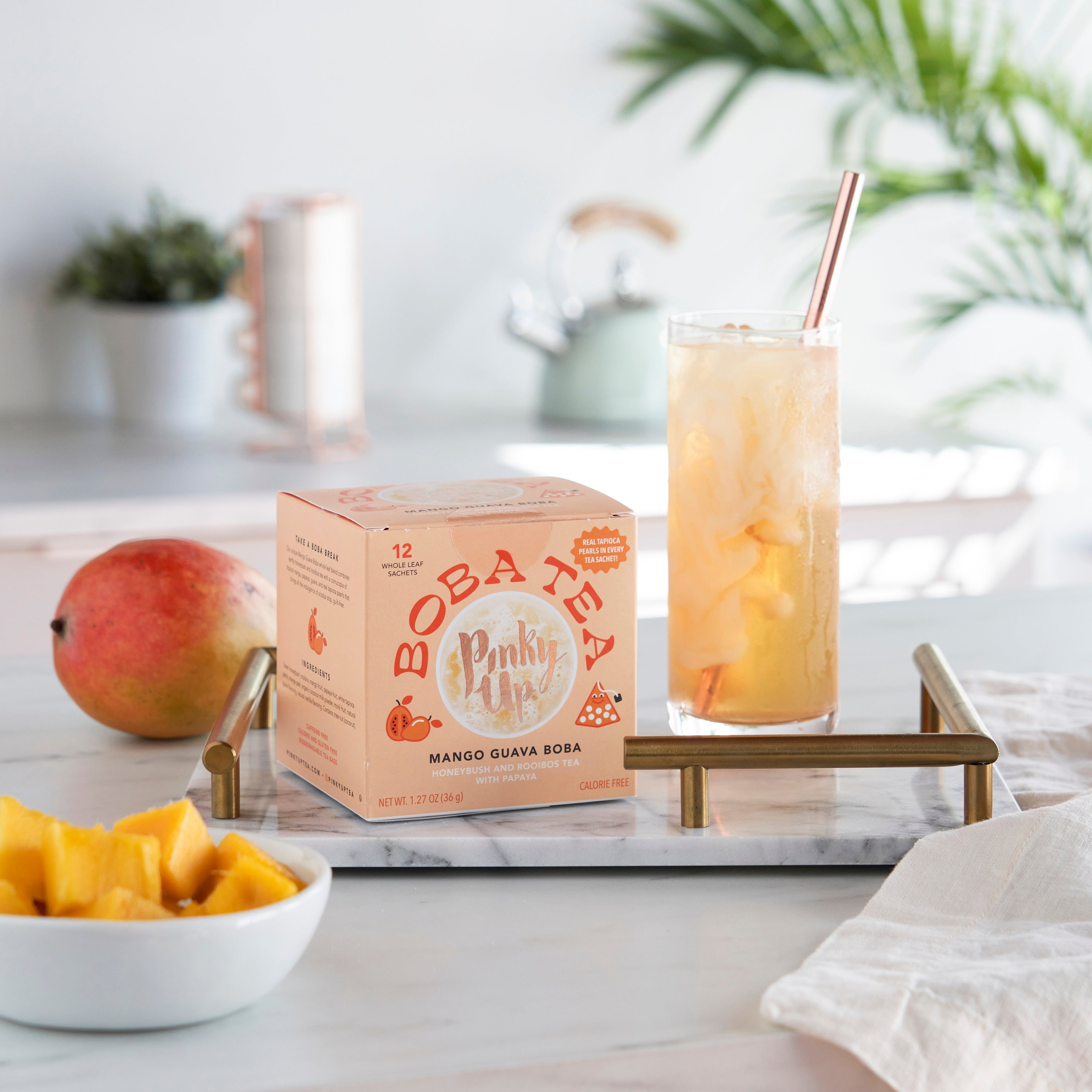 Pinky Up Mango Guava Boba Tea Sachets in packaging, featuring the brand Pinky Up, displayed on a flat surface.