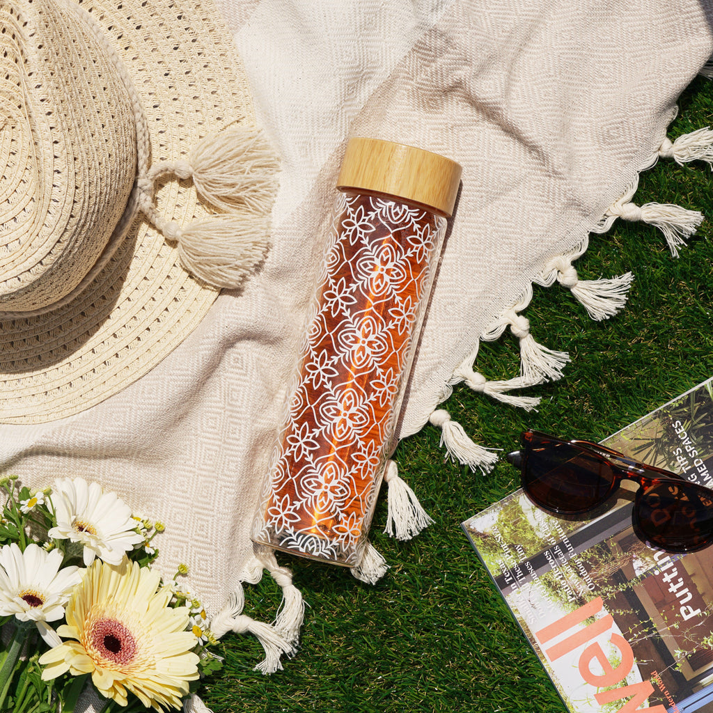 Pinky Up Blair: Marrakesh Glass Travel Infuser Mug, featuring a glass design with an infuser for tea or coffee on a white background.