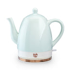 Pinky Up Noelle Ceramic Electric Tea Kettle in Mint with rose gold base, 1.5L capacity, and easy on/off switch.