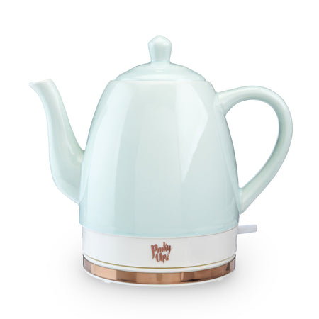 Pinky Up Noelle Ceramic Electric Tea Kettle in Mint with rose gold base, 1.5L capacity, and easy on/off switch.
