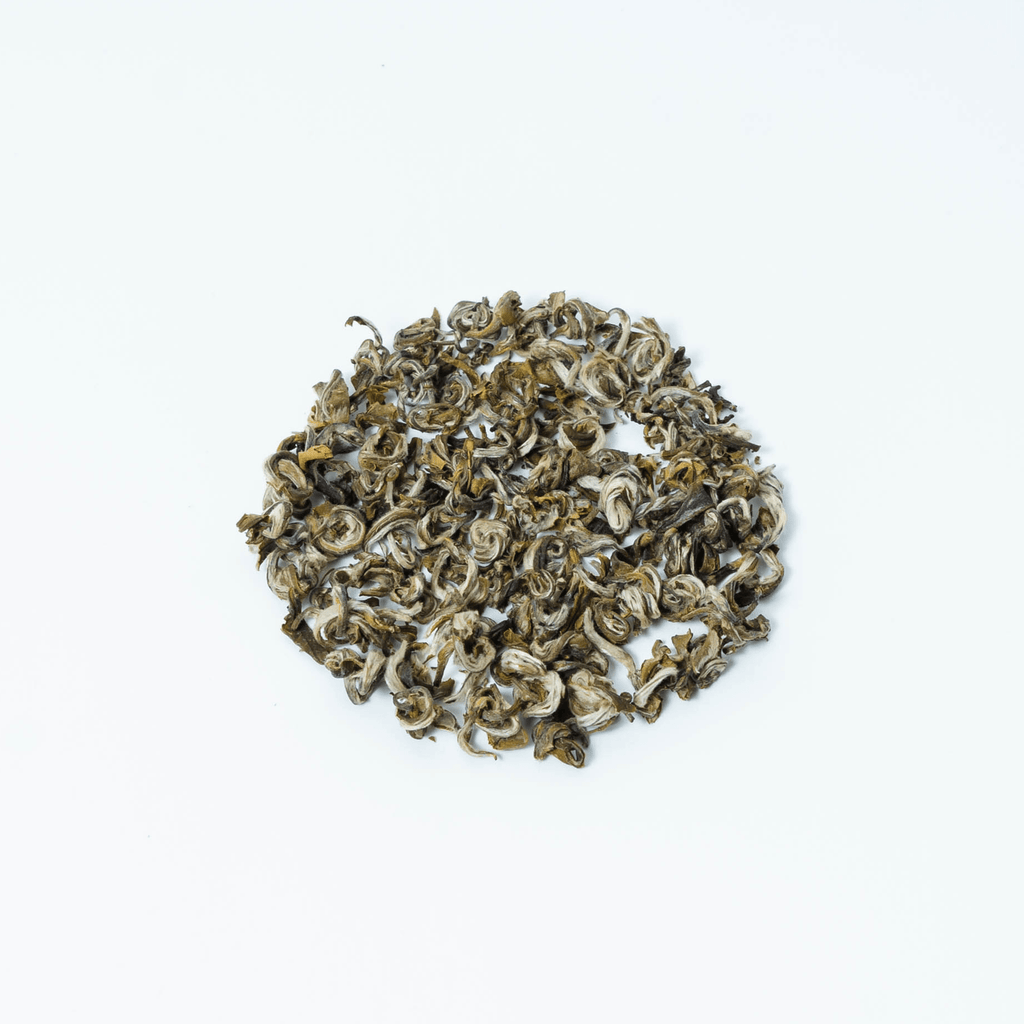 Farmers' Green tea by Nepal Tea, displayed in an environmentally-friendly packaging with a green color scheme.