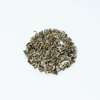 Farmers' Green tea by Nepal Tea, displayed in an environmentally-friendly packaging with a green color scheme.